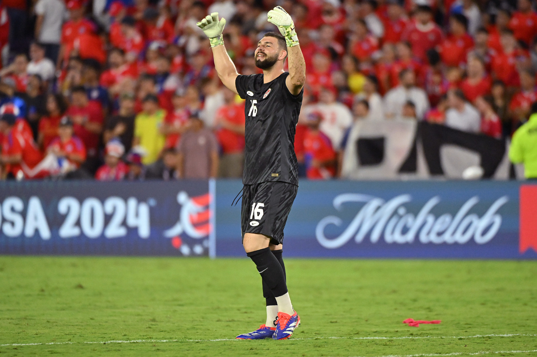 ORLANDO, FLORIDA - JUNE 29: Maxime Crepeau of Canada celebrates the team's progression to the quarter finals after the CONMEBOL Copa America 2024 Group A match between Canada and Chile at Inter&Co Stadium on June 29, 2024 in Orlando, Florida. (Photo by Julio Aguilar/Getty Images)